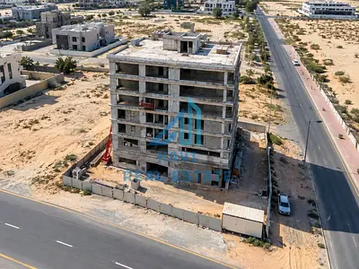 FREEHOLD G+P+5 /30 apartment building In Tilal city Sharjah