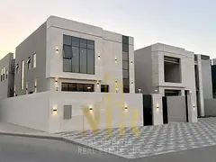 A villa in a strategic location near Al Zahia amenities, featuring high-end finishes and 4 master be