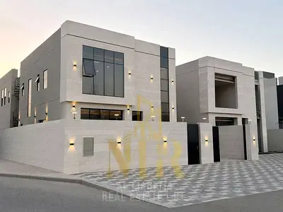 A villa in a strategic location near Al Zahia amenities, featuring high-end finishes and 4 master bedrooms. The price includes registration fees; free