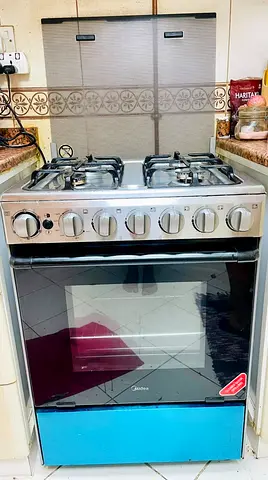 Midea 4-Burner Gas Oven and Cooker - Good Working Condition