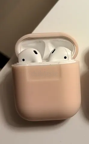 Used Apple AirPods (2nd gen) with silicone case - Good condition