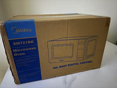 Brand new Midea microwave oven 20L (sealed box)