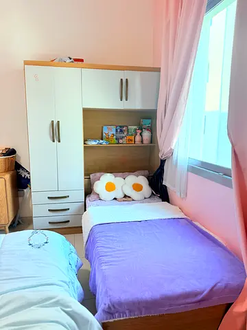 Single bed with built-in wardrobe and shelving — good condition