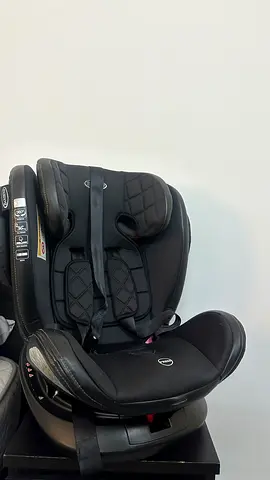 Good condition 360 child car seat - black
