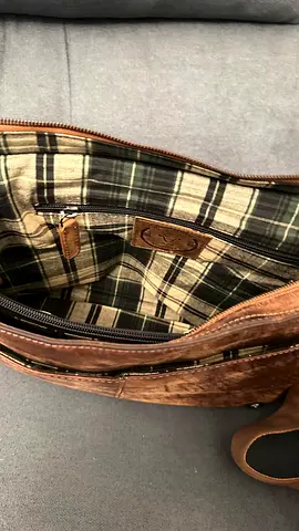 Brown leather shoulder bag with plaid interior - very good used condition