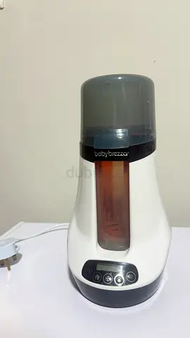 Baby Brezza Bottle warmer and bottle washerpro Combo..Along with some complementary Baby item.
