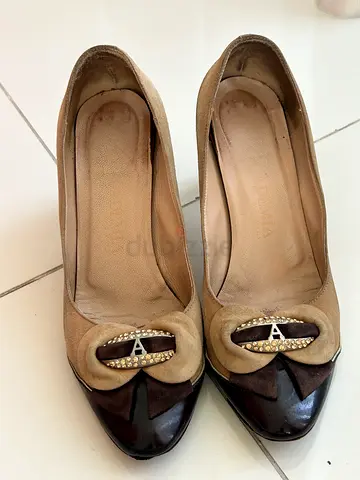 Used beige leather and suede women's pumps with embellished buckle, size 37-38.