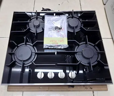 Miele 4-Burner Gas Hob - Glass Top, Stainless Knobs