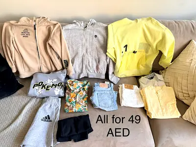 Bundle of casual clothing and hoodies - assorted size 7-8 years old good condition (All for 49 AED)