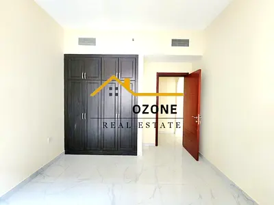 Elegant Apartment 2-BEDROOM With Covered Parking, Ready to Move, Close to Muwaileh Park