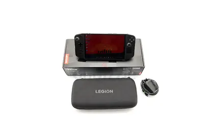 Lenovo Legion handheld gaming console with case and charger - good condition