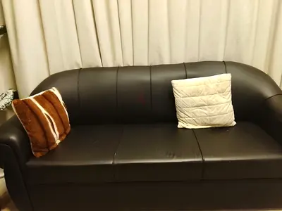 Black faux leather 3-seater and 2 seater sofa in good condition