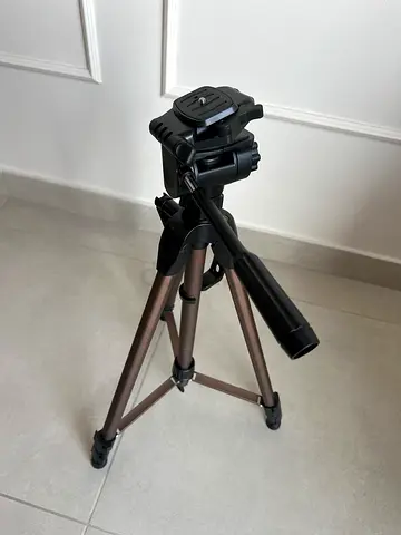 Lightweight aluminum camera tripod with pan head — excellent condition