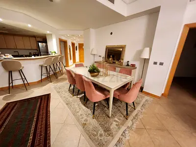 A BEAUTIFUL DINING TABLE FOR SALE WITH 8 CHAIRS FOR SALE!!