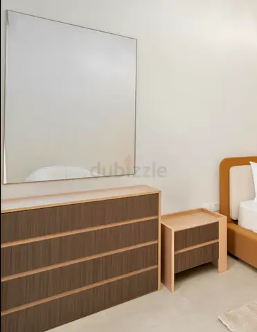 Wooden 4-Drawer Dresser in Good Condition