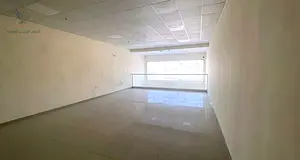 Commercial Showroom for Rent in Al Jurf Industrial 2 – Main Road | 1,550 Sq. Ft. | Mezzanine | Fir