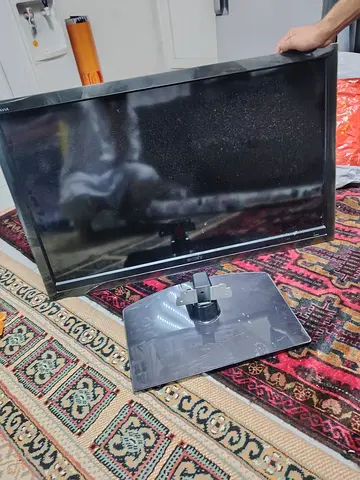 Sony Bravia 32-inch LED TV (screen and stand shown) - used
