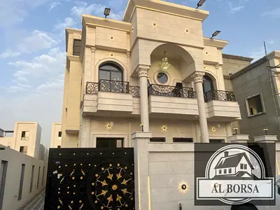 For sale in Al Zahia, Ajman: A classic-style villa featuring 5 bedrooms, a majlis, a living area, a kitchen, and a maid's room.