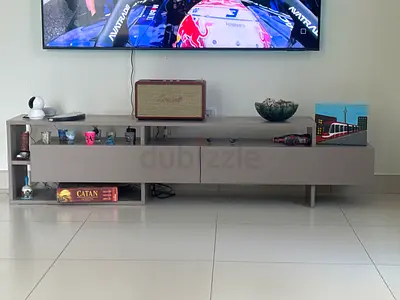 Low modern TV entertainment unit with storage drawers (grey)