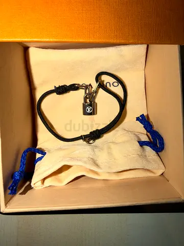 LOUIS VITTON Black polyster cord bracelet, Silver padlock charm - brand new - box and receipt