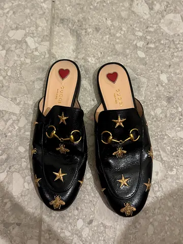 Black leather slip-on mules with gold stars and bee embellishments - EU 38