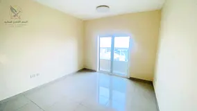 Spacious 1BR apartment for annual rent with 2 baths balcony built in wardrobes building gym prime lo