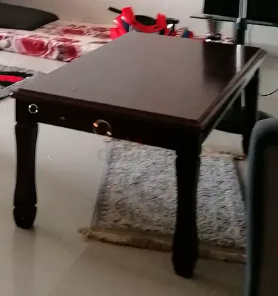 Solid dark wood dining table - 4 legs, good condition
