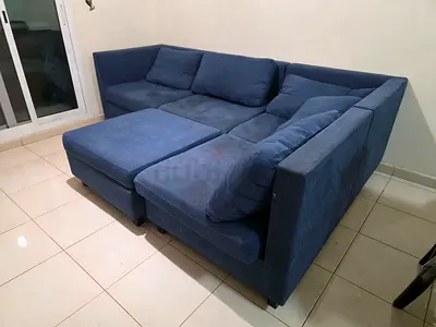 Blue L-shaped 5-seater Fabric Sofa with Cushions - Good Condition. No damages on cushions or fabric.