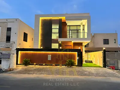 Embrace the lifestyle you deserve in the heart of Ajman. A luxurious, modern villa for sale in the Al Bahia area, featuring contemporary architecture