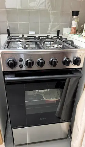Midea Stainless Steel 4-Burner Gas Cooker with Oven - Good Condition