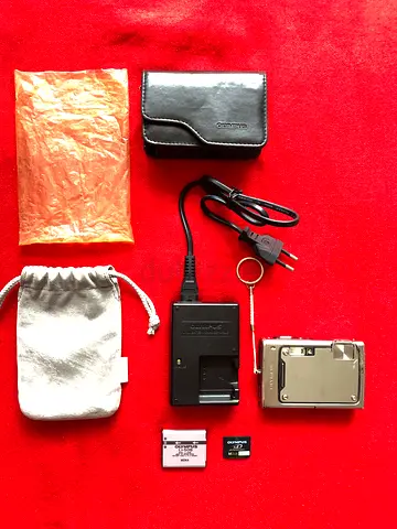 Olympus Stylus 1030 SW 10.1MP - (Digital Camera + Charger + Battery + Memory Card 2GB + Cases)