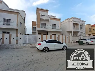 For sale in Al Yasmeen, Ajman: a villa featuring 5 bedrooms, a majlis, a living room, a kitchen, and a maid's room.