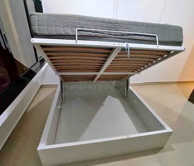 Ikea hydraulic bed with mattress queen size