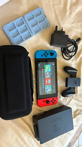 Nintendo Switch console with dock, Joy-Cons, case and charger - good condition