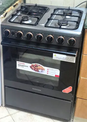 Toshiba 4-Burner Gas Cooker with Oven - Good Working Condition