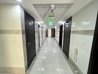 Two BHK in Al Taawun with balcony, 2 bathrooms, panoramic bedroom views, open-view kitchen, family residence, easy payments, direct Dubai Exit.