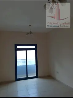 One-bedroom apartment with a living room in Al Rashidiya; prime location, suitable for families.