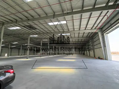 A premium warehouse is available for rent in Umm Al Quwain. It is a first-user warehouse with a large space suitable for companies, factories,