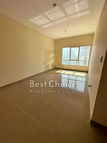 Near Al Buhaira Police Station; high floor with an open view Two master bedrooms, plus an additional bathroom; built-in wardrobes; space provided for