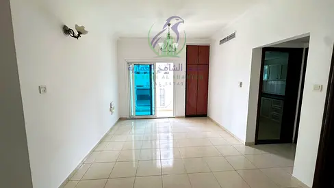 One bedroom apartment for annual rent in Al Taawun Sharjah master bedroom spacious modern finish balcony open view built in wardrobes prime location
