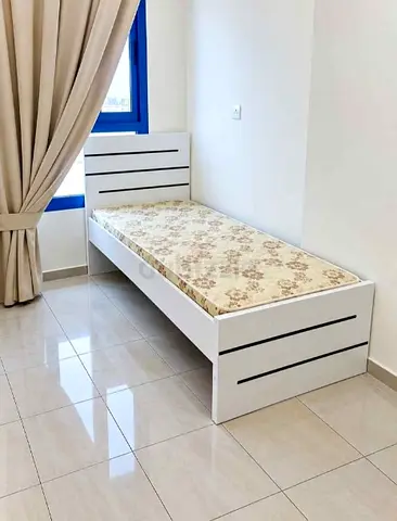 Single white wooden bed frame with mattress - good condition