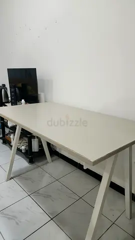 Simple white dining table - compact and sturdy