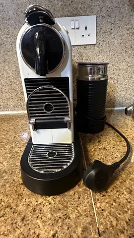 Nespresso capsule coffee and espresso machine