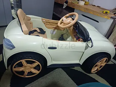 Electric ride-on toy car for kids — single seater, cream