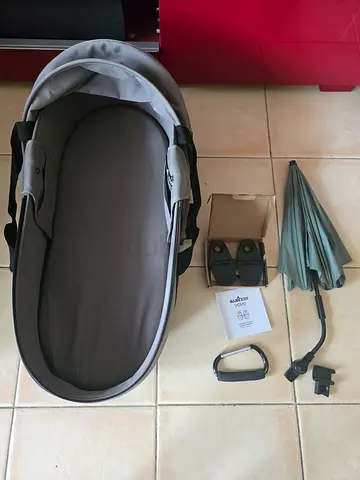 Gray Baby Carrycot / Bassinet - Good Condition with umbrella all for 300aed