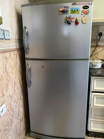 Silver Double-Door Refrigerator - Good Working Condition