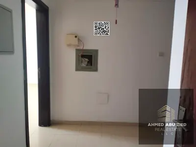Two-bedroom apartment with a living room available for annual rent in City Tower; includes free parking. Features a spacious layout, an open view, and