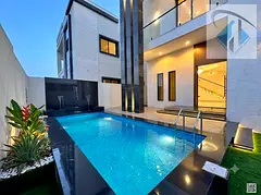 Villa with a swimming pool, central air conditioning, and European-style finishing.