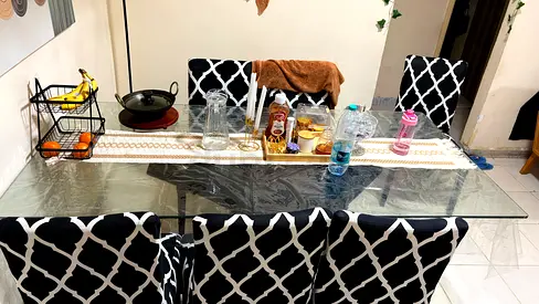 Glass Top Dining Table with 6 Patterned Chairs - Good Condition