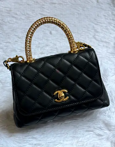 Black Quilted Top-Handle Handbag with Gold Hardware